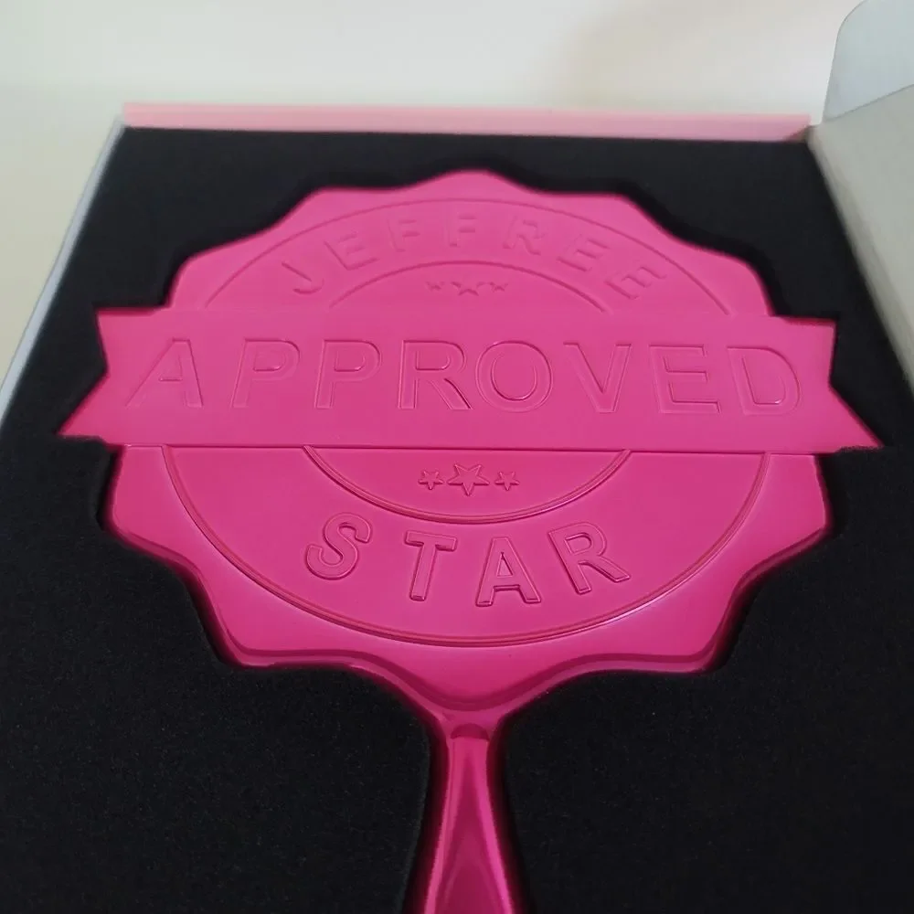 Jeffree Star hand mirror pink chrome